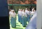 ‎Satgas TMMD 128 ‎Satgas TMMD 128 Gresik Tanamkan Disiplin dan Semangat Kebersamaan