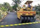 Kedamean Gresik: Kerjasama TNI dan Masyarakat Sukseskan Proyek Pengaspalan